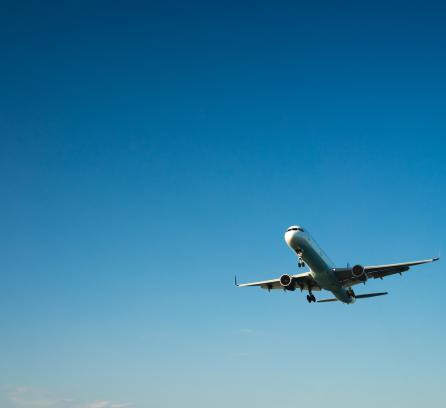 airplane flying in daytime sky