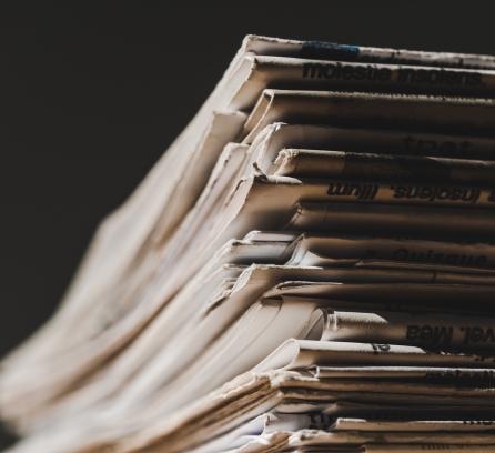 Stack of print newspapers