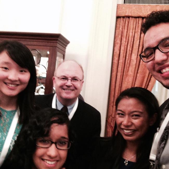 Sean with students in Singapore