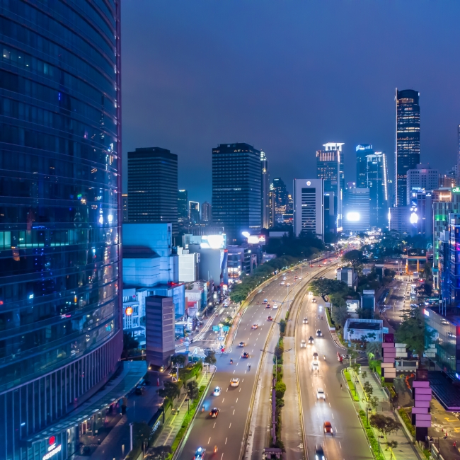 Aerial View of modern city center with skyscrapers Downtown Jakarta at Night