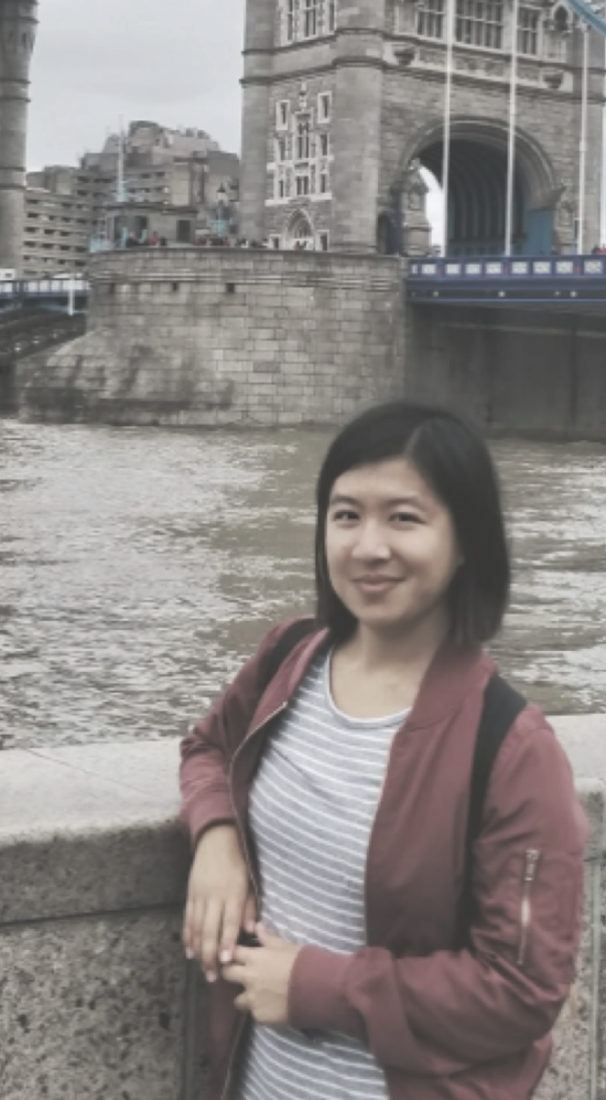 Student standing in front of Tower Bridge