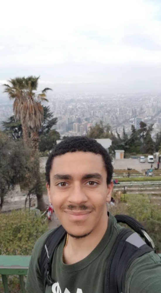 Kinan Martin selfie from the top of Cerro San Cristobal, overlooking the city of Santiago, Chile