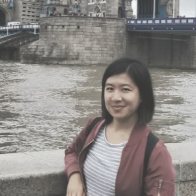 Student standing in front of Tower Bridge