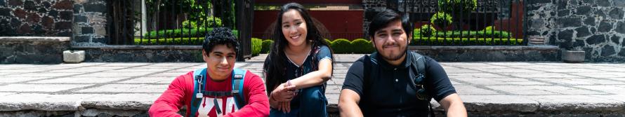 students sitting on steps in Mexico