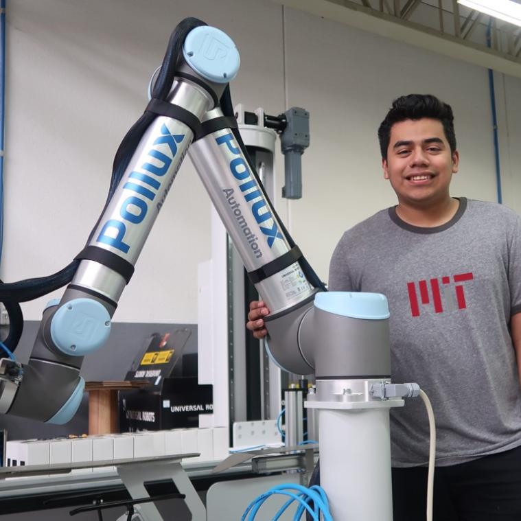 Robotics and Student in MIT Shirt