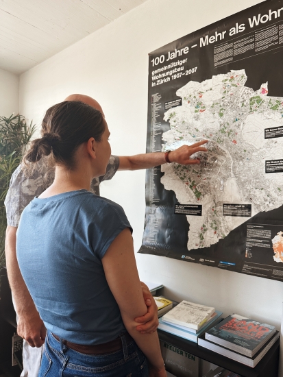 Laura-India Garinios standing in front of a map